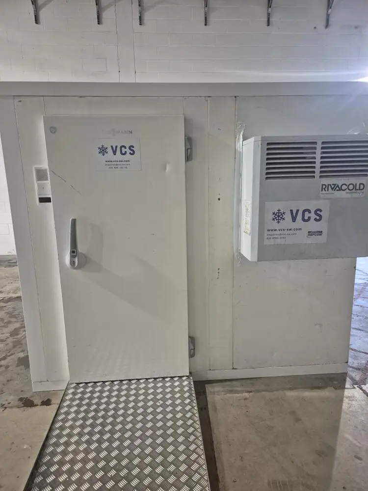 Cold Room entrance with access ramp and refrigeration motor.
